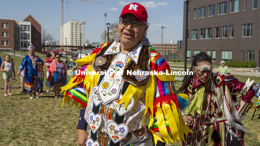 Kennard Parker proudly dances in regalia and a Husker hat. 2022 UNITE powwow to honor graduates (K through college). Held April 23 on the greenspace along 17th Street, immediately west of the Willa Cather Dining Center. This was UNITE’s first powwow in three years. The MC was Craig Cleveland Jr. Arena director was Mike Wolfe Sr. Host Northern Drum was Standing Horse. Host Southern Drum was Omaha White Tail. Head Woman Dancer was Kaira Wolfe. Head Man Dancer was Scott Aldrich. Special contest was a Potato Dance. April 23, 2023. Photo by Troy Fedderson / University Communication.